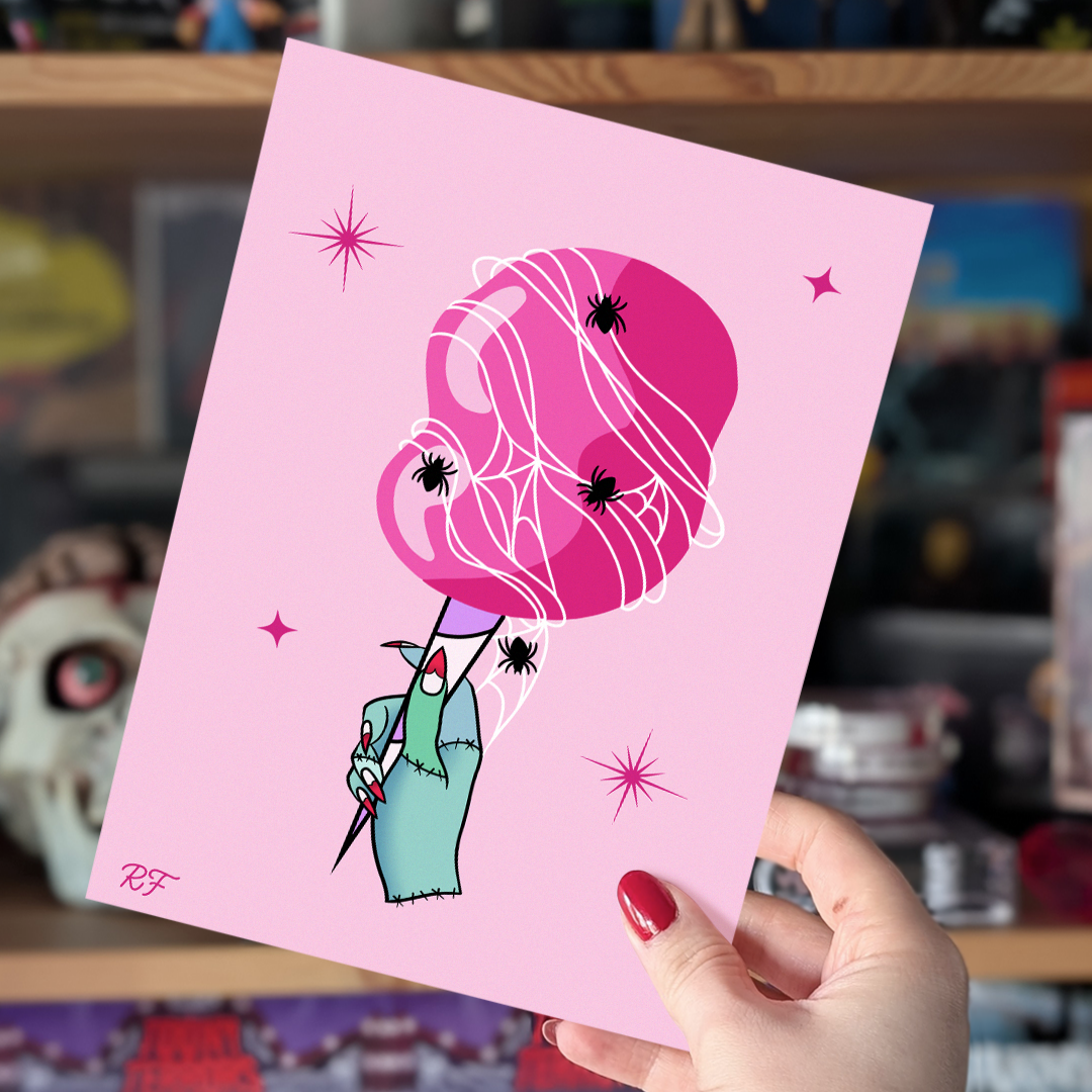 This art print features a delightfully creepy combination of candyfloss, with added spiders and web, this cute and creepy candyfloss design is set against a pastel pink backdrop.
